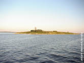 Фото одного из Соловецких островов в море